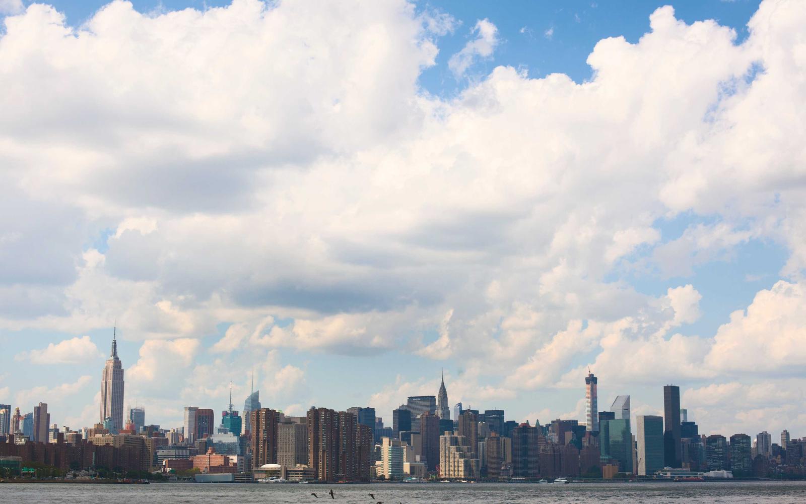 City skyline under summer clouds